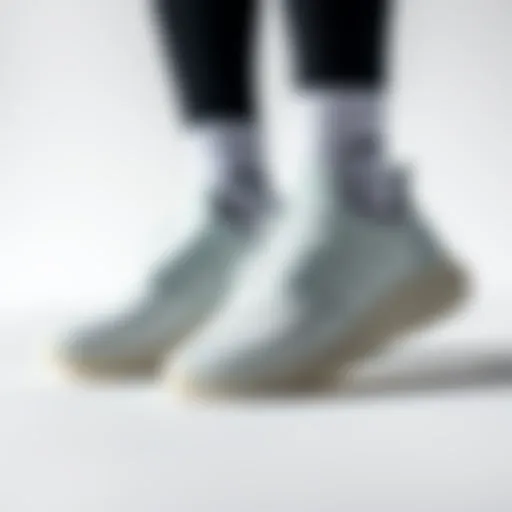 Sleek and stylish Adidas Cloudfoam shoes showcased on a minimalist background