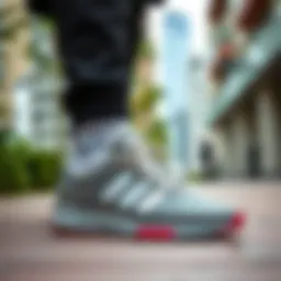 Stylish Adidas GW8336 in an urban setting.