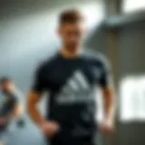 Dynamic athlete wearing Adidas printed t-shirt during workout