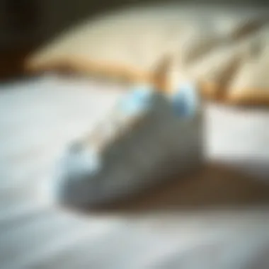 Adidas Superstar baby shoes on a soft surface highlighting comfort