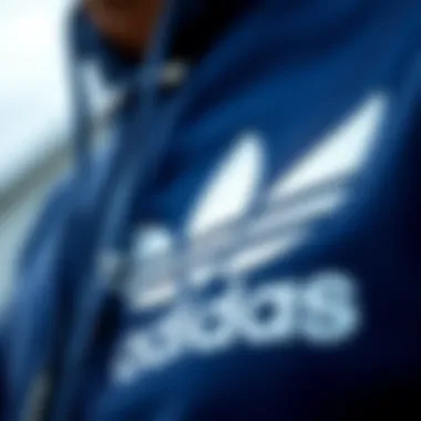 Close-up of the iconic Adidas trefoil logo representing its cultural significance