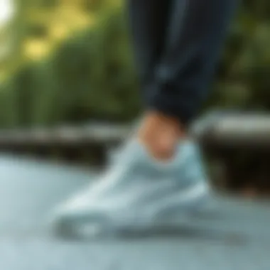 Fashionable outfit incorporating Asics grey shoes