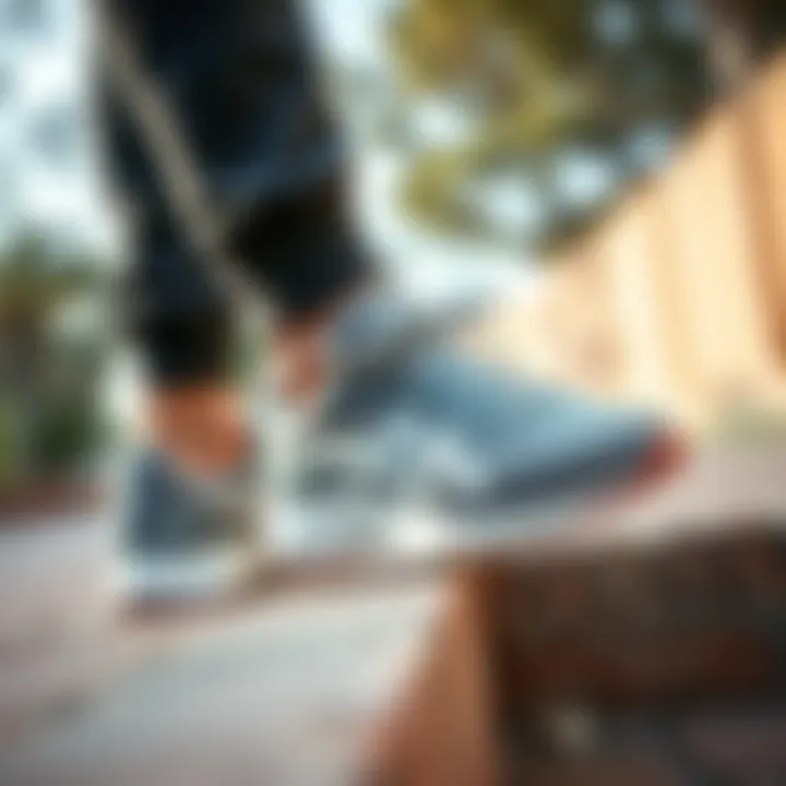 Asics grey sneakers in an outdoor setting