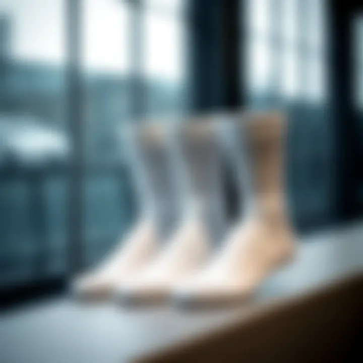 Stylish white sport socks displayed on a modern surface