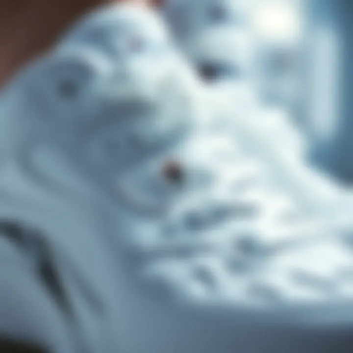 Close-up of Fila white shoes highlighting design details
