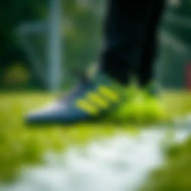 Close-up of football boots on grass