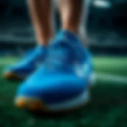 A close-up view of the blue artificial turf shoes showcasing their intricate design.