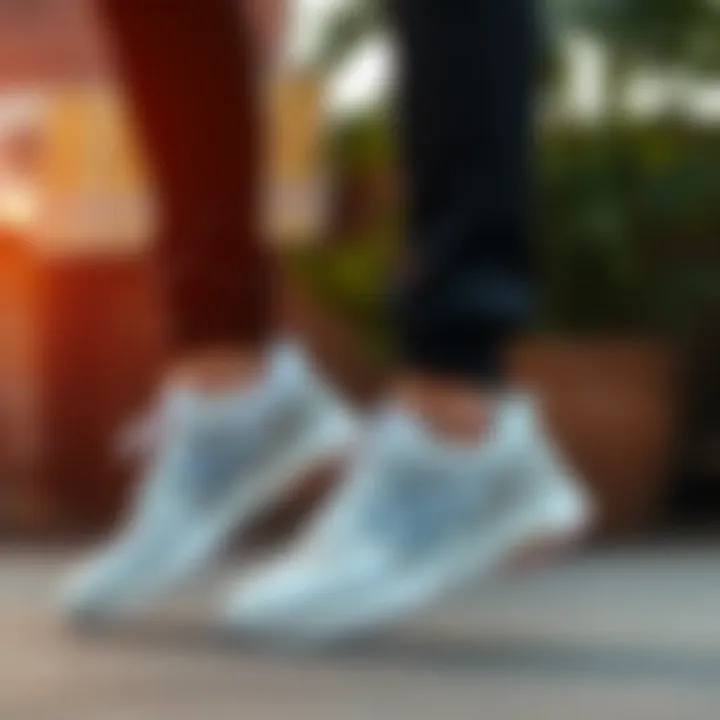 A stylish outdoor scene featuring an individual wearing New Balance white shoes in a casual setting.