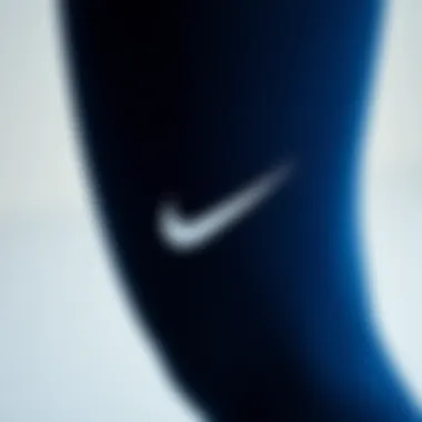 Close-up of the fabric texture and quality of Nike navy leggings