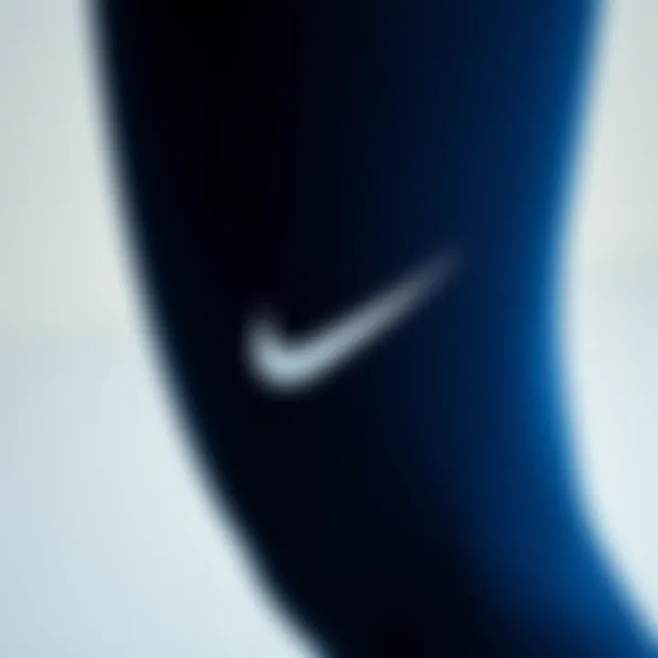 Close-up of the fabric texture and quality of Nike navy leggings