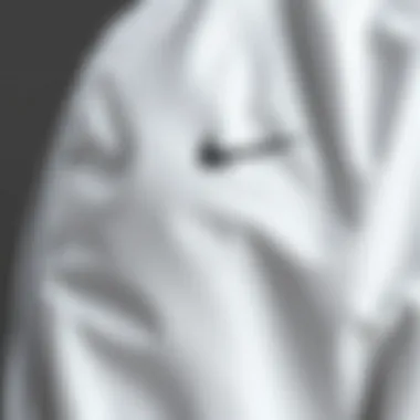 Close-up of the fabric texture of a white Nike jacket
