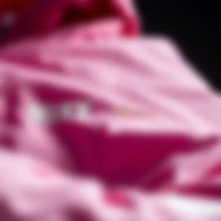 Close-up of the fabric and design details of the pink Nike jacket