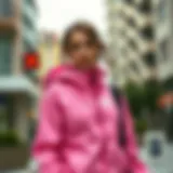 Stylish pink Nike jacket on a model in an urban setting