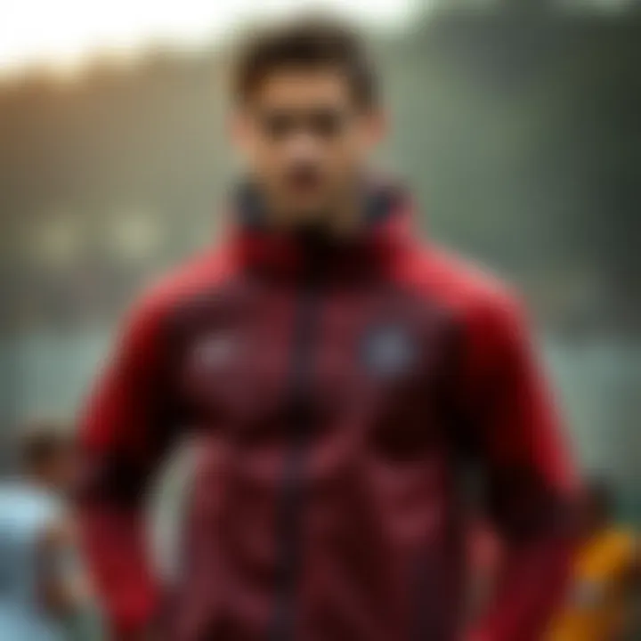 A model showcasing the PSG rain jacket in a sporty outdoor environment.