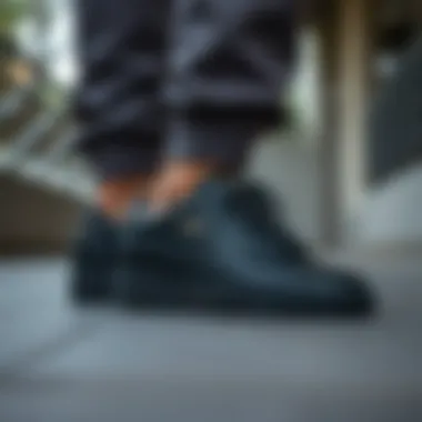 Puma black leather shoes paired with casual attire