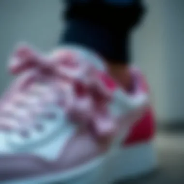 Close-up of the intricate bow detail on Puma shoes