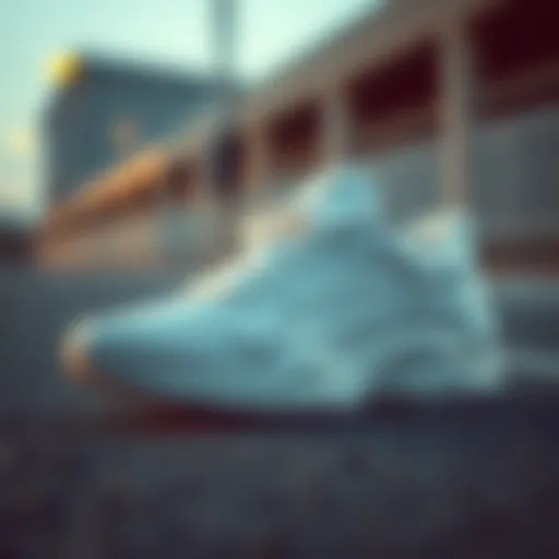 Elegant white Puma sports shoes showcasing a modern design.