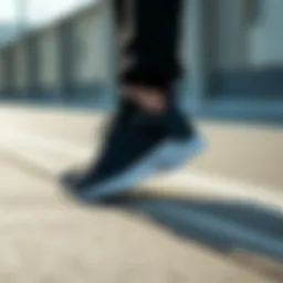 Elegant black sporty shoes on a stylish surface