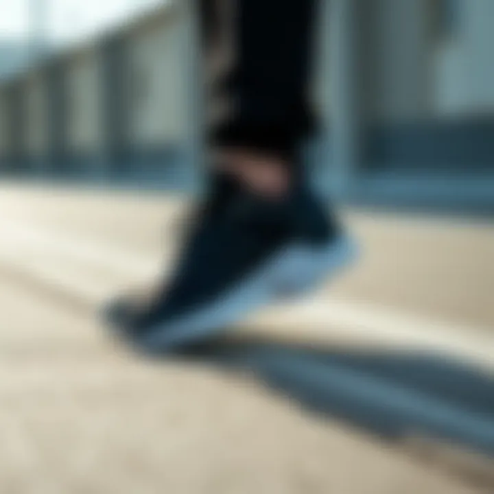 Elegant black sporty shoes on a stylish surface