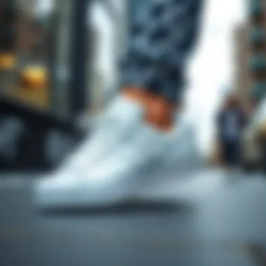 Adidas Superstar white sneakers styled with casual outfit on urban setting