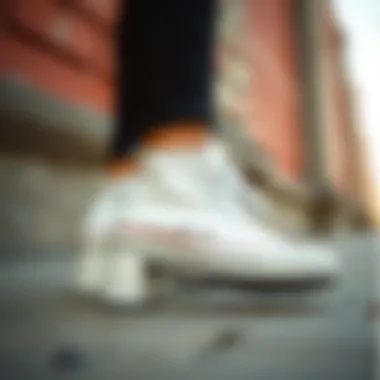 Close-up of a chic outfit featuring heeled Converse footwear